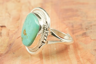 Genuine Royston Turquoise Stone set in Sterling Silver Ring. The Royston Turquoise Mine is located in Nye County, Nevada. Created by Navajo Artist John Nelson. Signed by the artist.